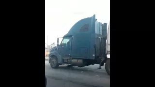 Semi crashes into train bridge in Davenport Iowa