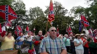 Confederate flag supporters sing I Wish I Was in Dixie