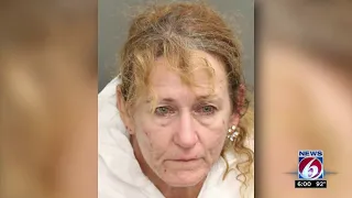 Woman arrested in double stabbing