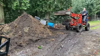 Homemade super cheap mini loader in action