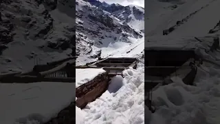 a lot of snow in high atlas mountains in Morocco . (the way between chamharouch and the camp. refuge