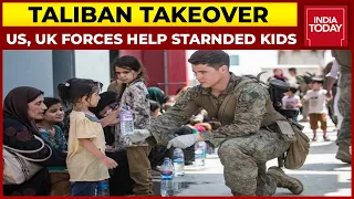 Taliban Takeover: Children Flung Over Wires By Parents, US, UK Forces Help Stranded Kids