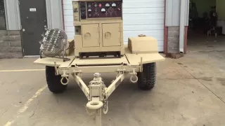 Trailer mounted MEP-803A 10KW Military Tactical Quiet Diesel Generator Load Test for eBay ad.