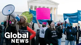 Dueling protests on steps of US Supreme Court as justices take up abortion question