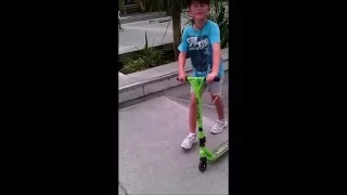 9 year old scooter tricks