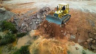 Satisfying Process Giant Land Filling Construction Bulldozer Pushing Rock Mix Soil Drop To Water