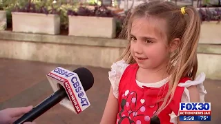 Little girl gives food to homeless in Downtown Jacksonville