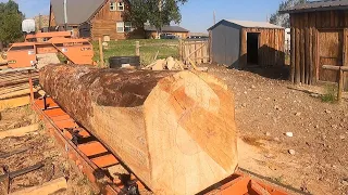 A big doug fir log on the Woodmizer LT15 cut into 1x for board and batt siding
