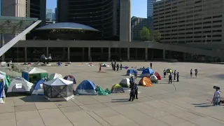 Anti-police protesters camped out in front of City Hall cleared out by security