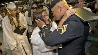 Military dad surprises his Killian high school graduate