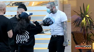 Post Malone Shops at Louis Vuitton Surrounded by Bodyguards But Still Stops To Pose with Fans