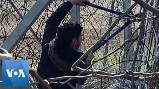 Migrants Attempt to Cut Through Fence at Greece-Turkey Border