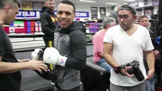 Pacquiao gives sparmate Arnold Gonzales a present at last Wild Card workout