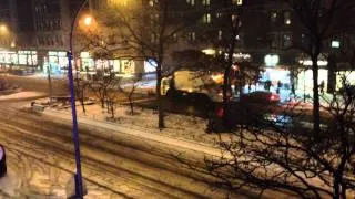 DSNY GARBAGE TRUCK PLOWING SNOW ON BROADWAY ON THE WEST SIDE OF MANHATTAN DURING WINTER STORM DION.