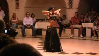 Belly dance with scimitar
