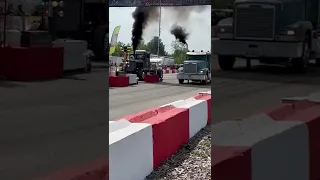 Drag truck vs Class A race truck at Great Lakes Big Rig Challenge