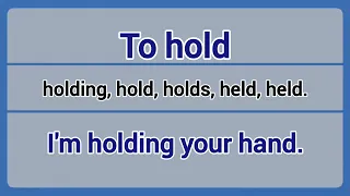 Irregular Verb - to hold (holding, hold, holds, held).