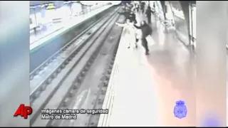 Raw Video: Man Rescued on Madrid Railway Tracks