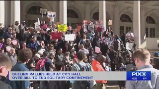 Dueling rallies held at City Hall over bill to end solitary confinement