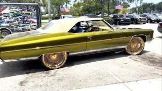 Nava's 71 Chevy on Gold 24's Daytons and A Cadillac on Chrome 24's  Daytons at Coast 2 Coast Customs