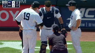 MIL@NYY: Sanchez stays in after getting hit by a foul