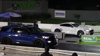 Ford Explorer ST vs Mustang GT Drag Race