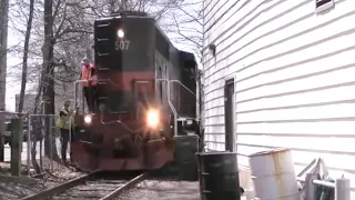 Train passes inches from building! - Trains at Peabody Square, MA