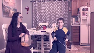 Kids trying violin