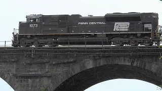 Penn Central Heritage Unit #1073 Leads Across Rockville Bridge