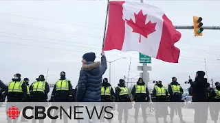 Police move to clear protesters blocking the Ambassador Bridge in Windsor, Ont.