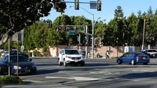 Raw: Officer Pulls Man From Train Tracks