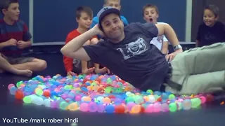 1500 Water Balloons + Trampoline- SLOMO!! @MarkRober