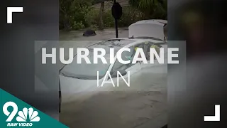 Hurricane Ian: Woman rescued from flooded car