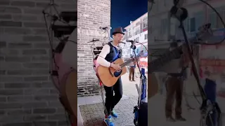 amazing busker street performer sing hit songs