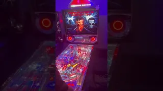 My restored Terminator 2 pinball machine and an original T2, side by side at UK Pinfest 2022