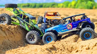 RC CARS Sand Storm Racing – 2 WlToys 10428 VS Axial Wraith