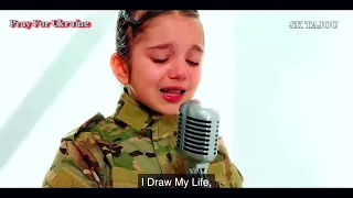 9 year old ukrainian girl sings for her nation to ask for peace