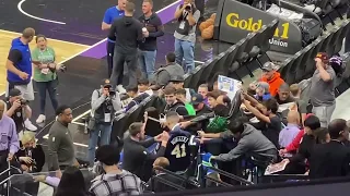 Luka Doncic and fans in Sacramento. Before game cheering, signing autographs