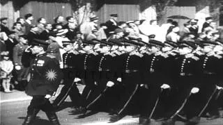 Joseph Stalin, Georgy Malenkov, Anastas Mikoyan review a parade during May Day ce...HD Stock Footage