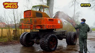 De Atlas graafmachine schoonspuiten #1179