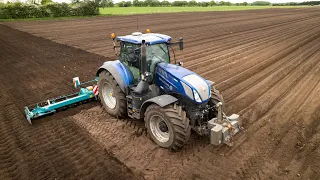 New Holland fleet planting potatoes