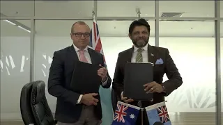 Fijian Attorney-General officiates at the signing of the direct grant agreement