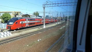 Riding aboard ESH2 Aeroexpress train from Domodedovo airport to Moscow Paveletsky railway station.