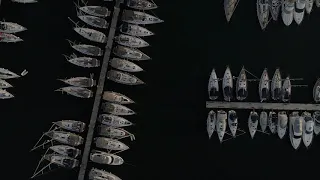 Video Background Stock Footage Free ( Port, yachts, flying by a drone on the piers and marinas )