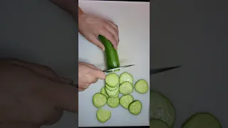 Kitchen Test - Barebones Living Woodsman No. 6 Field Knife Slicing a Giant Garden Cucumber