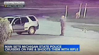 Suspect sought after 4 Michigan State Police cruisers set on fire, shot at