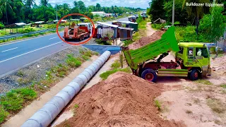Full video of a five ton Truck laying soil and clearing sewers to meet ASEAN Rond 100%