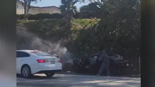 California Freeway robbery caught on camera as man gets stuff stolen after car crash