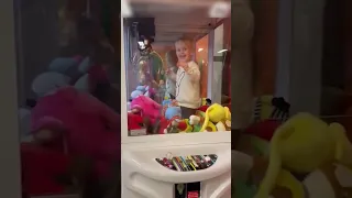 Little Boy Climbs into an Arcade Claw Machine and Gets Stuck #shorts