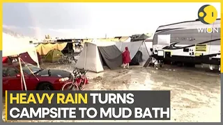 Burning Man festival-goers trapped in desert as rain turns site to mud | Latest World News | WION